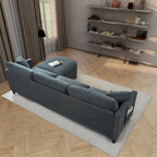 Canapé d'angle 4 places en tissu gris foncé avec pouf et accoudoir de rangement