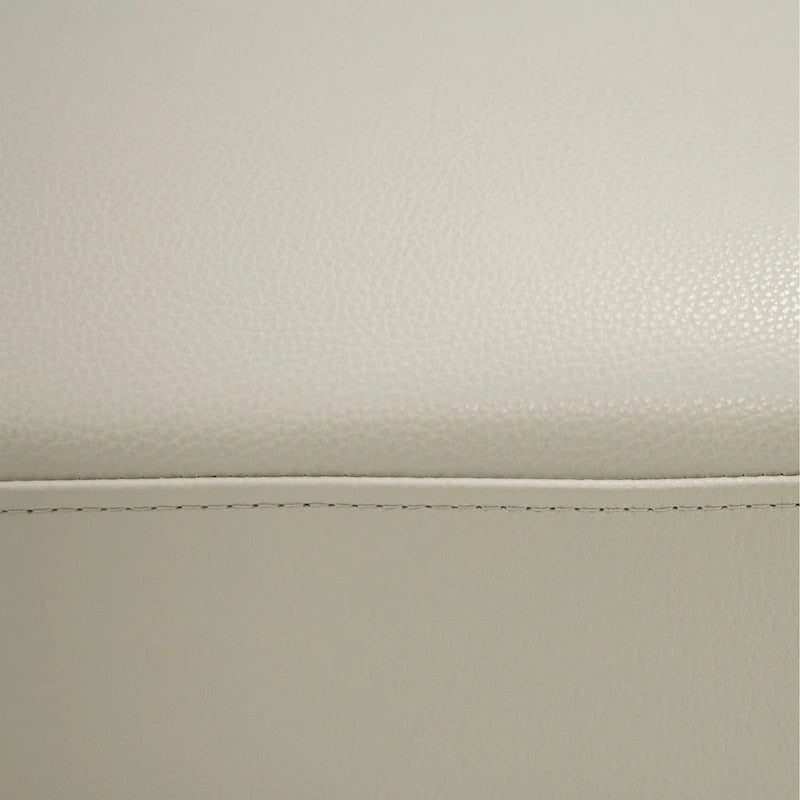 Pouf rectangulaire gris, revêtement en cuir, une place